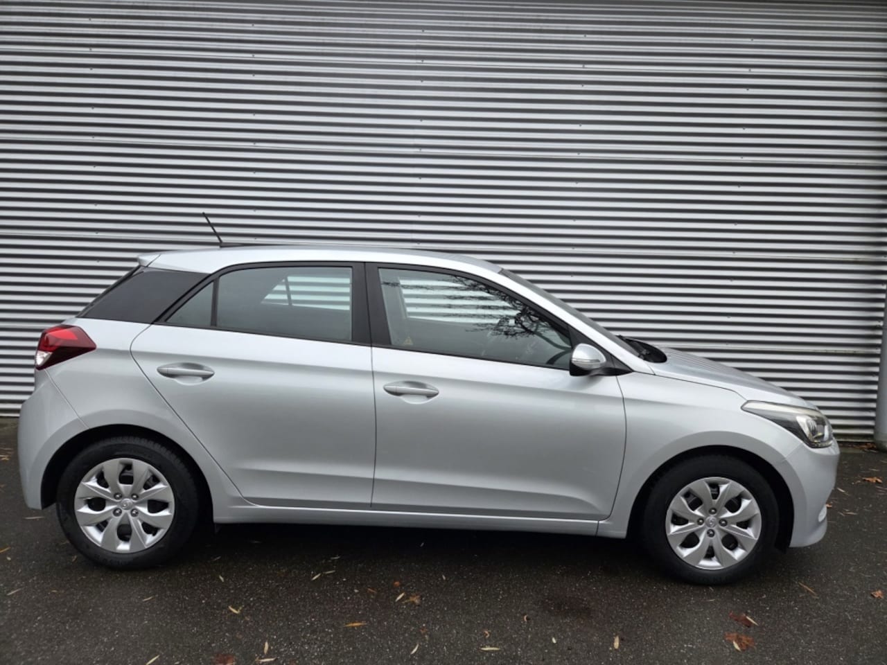 Hyundai i20 - 1.2 HP i CLIMATE CONTROL, CRUISE CONTROL, ACHTERUITRIJCAMERA - AutoWereld.nl