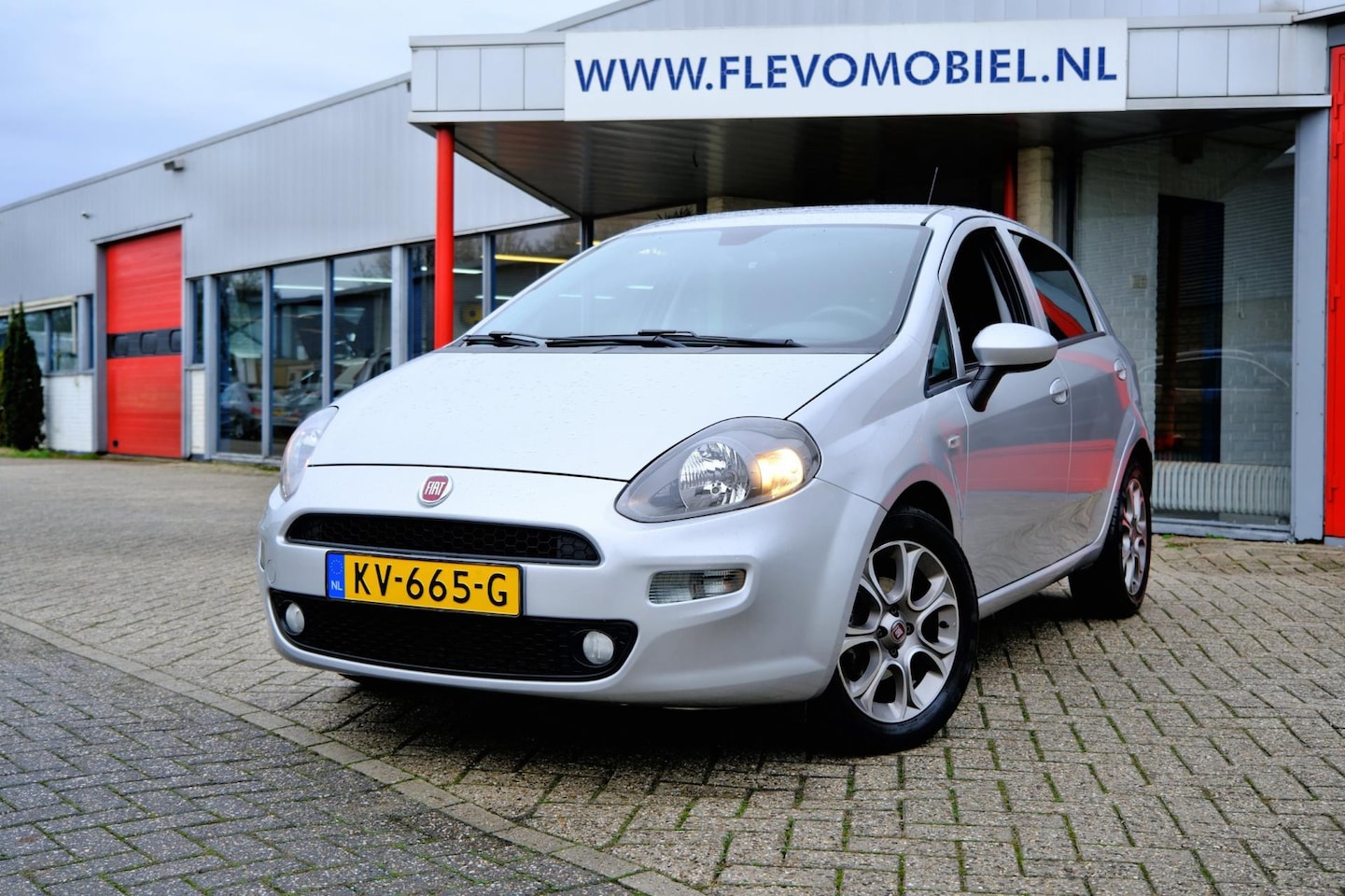 Fiat Punto Evo - 0.9 TwinAir Lounge 5-drs *44.446km!* Clima|1e Eig!|Cruise|LMV|PDC - AutoWereld.nl