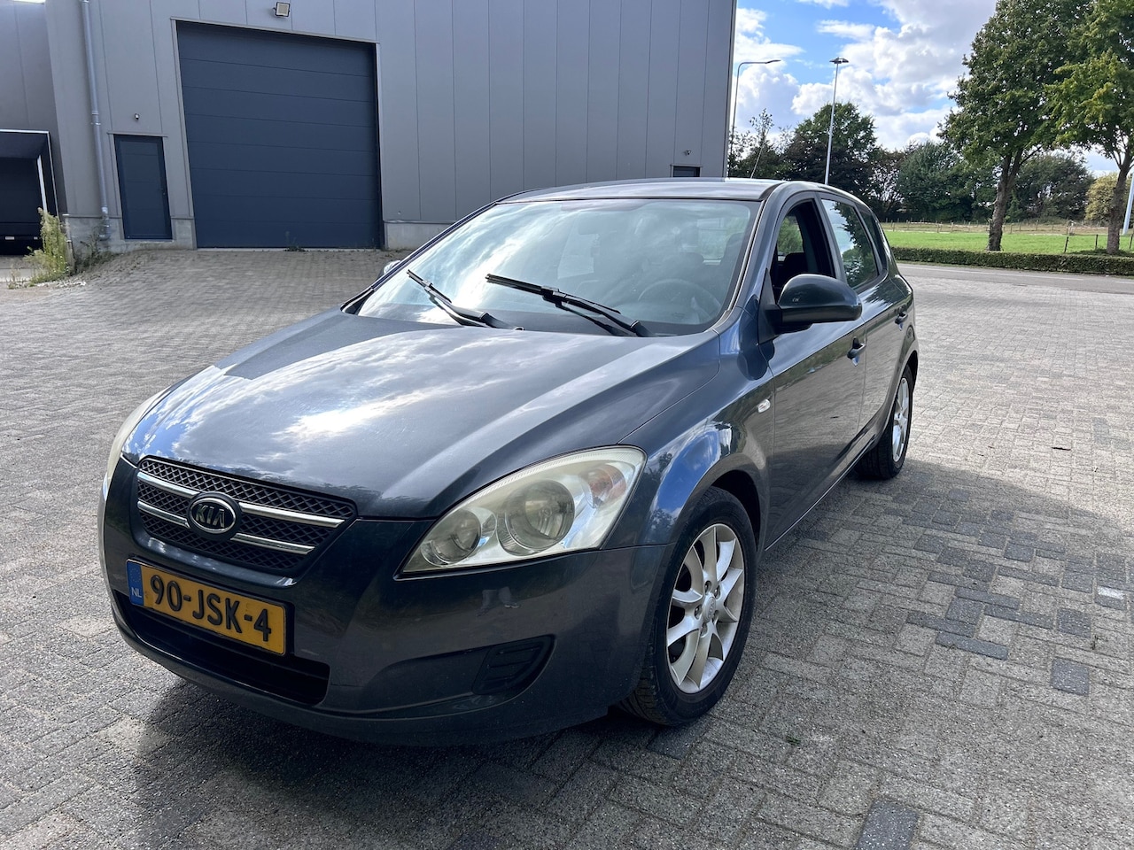 Kia Cee'd - 1.4 Fifteen ISG Airco - AutoWereld.nl