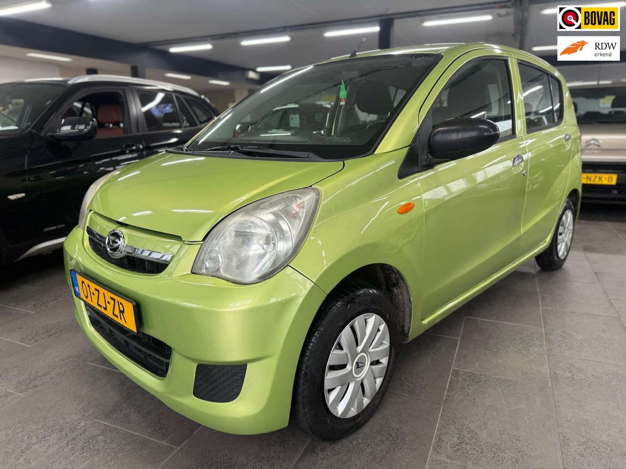 Daihatsu Cuore - 1.0 Trend 5-deurs stuurbekrachtiging zeer zuinig apk 20-12-2026 - AutoWereld.nl