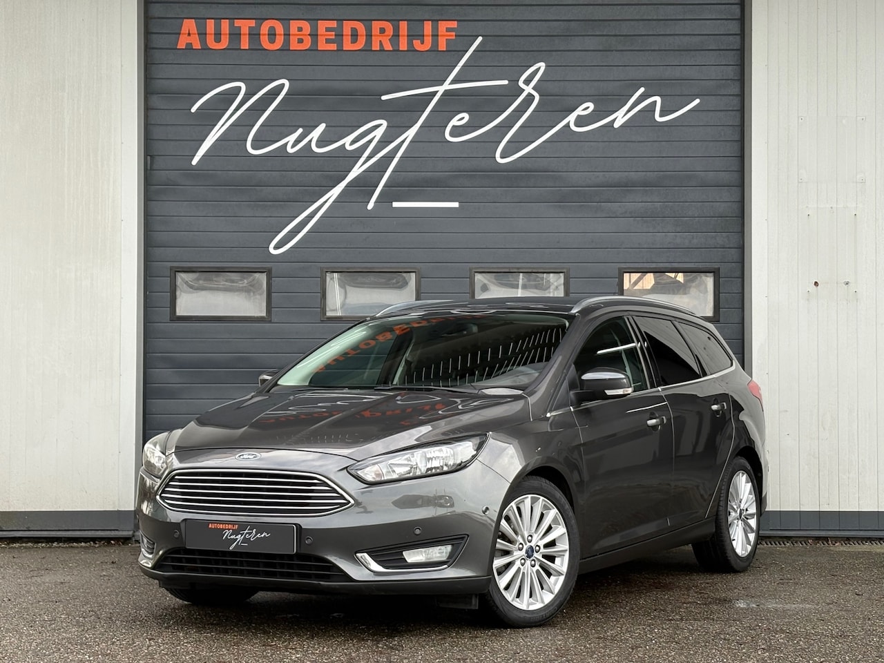 Ford Focus Wagon - 1.0 Titanium Edition|Park assist|Clima|Cruise - AutoWereld.nl