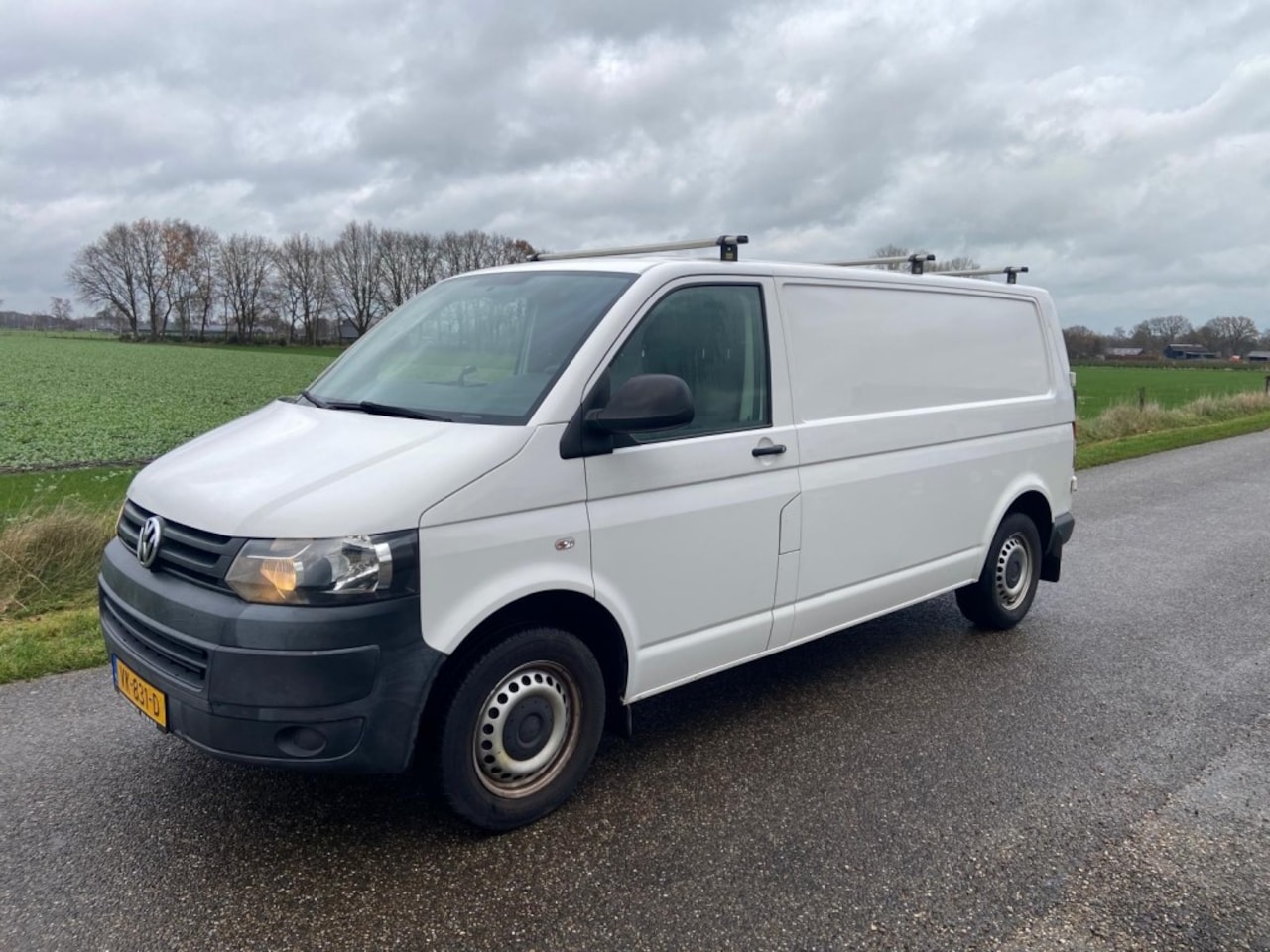 Volkswagen Transporter - 2.0  140 PK    3 Zitplaatsen   euro 5  L2H1 - AutoWereld.nl