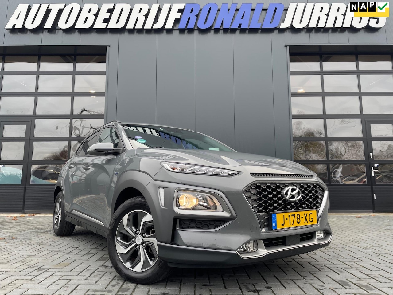 Hyundai Kona - 1.6 GDI HEV Fashion NL.Auto/Apple Carplay/Climatronic/Navigatie/Camera/1Ste Eigenaar/Deale - AutoWereld.nl