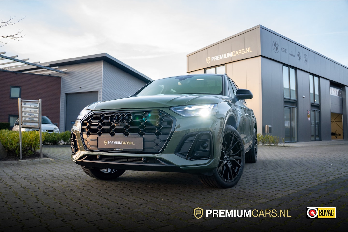 Audi Q5 - 55 TFSI e| District green | S-Line | Panoramadak | - AutoWereld.nl