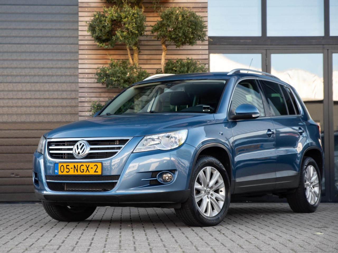 Volkswagen Tiguan - 1.4 TSI Sport&Style 4Motion Trekhaak Cruise Airco - AutoWereld.nl