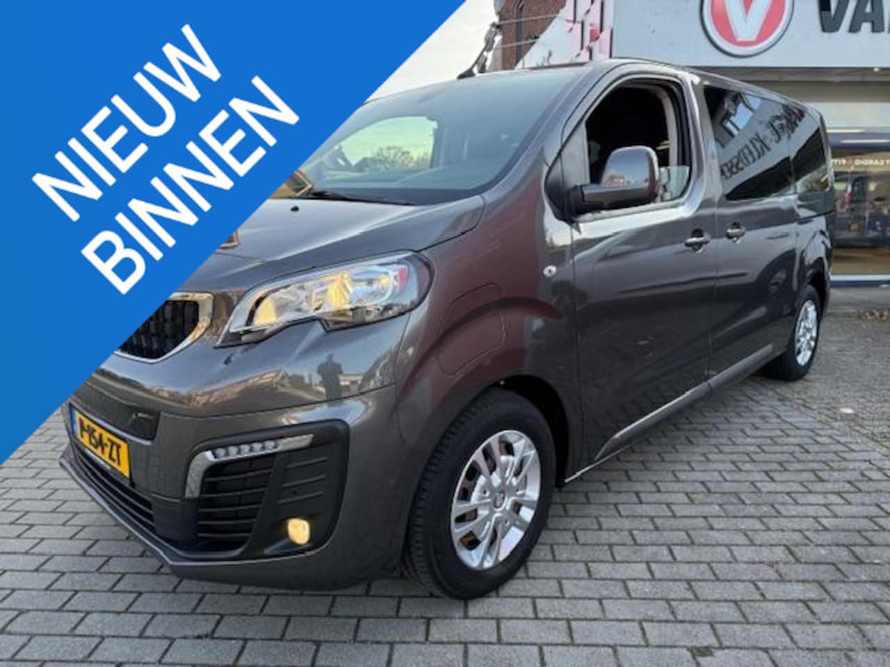 Peugeot e-Traveller - 50 kWh Business 2x schuifdeur camera pdc cruise 9 persoons - AutoWereld.nl