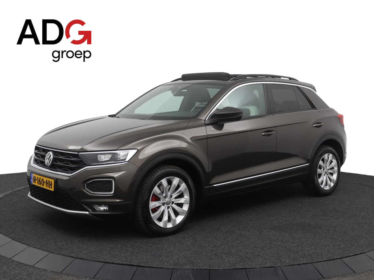 Volkswagen T-Roc - 1.5 TSI Sport | Panoramadak | Elektrische kofferklep | Trekhaak - AutoWereld.nl