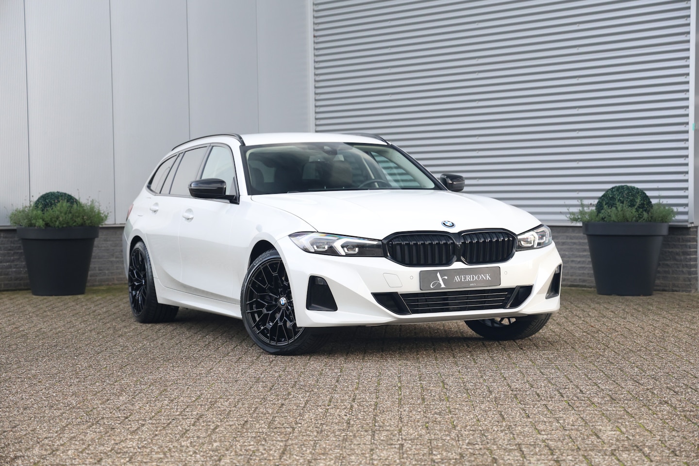 BMW 3-serie Touring - 320e Executive Sport NAP|Sportst|Leder|Carplay|Curved|LCI - AutoWereld.nl