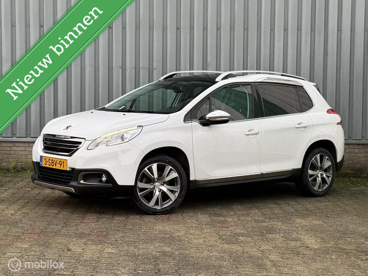 Peugeot 2008 - 1.6 VTi Allure | Leder | Grip Control | Pano - AutoWereld.nl