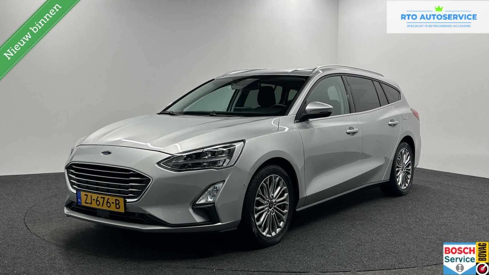 Ford Focus Wagon - 1.0 EcoBoost Titanium Business CAMERA CRUISE LM CARPLAY TREKHAAK. - AutoWereld.nl