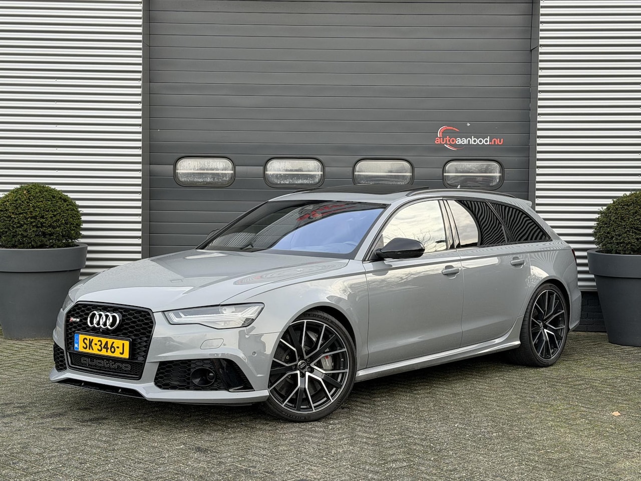 Audi A6 Avant - 4.0 TFSI RS6 Quattro Performance | Keramische Remmen | Panoramadak | Head-Up | Carbon | DA - AutoWereld.nl