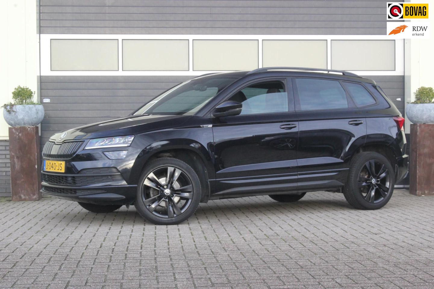 Skoda Karoq - 1.5 TSI ACT Sportline Business | Trekhaak | - AutoWereld.nl