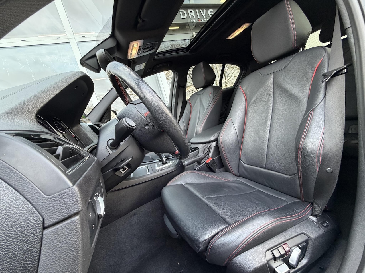 BMW 1-serie - 118i Edition Sport Line Shadow High Ex. |Schuif/kanteldak|Harman Kardon|Leer|Memory|Carpla - AutoWereld.nl