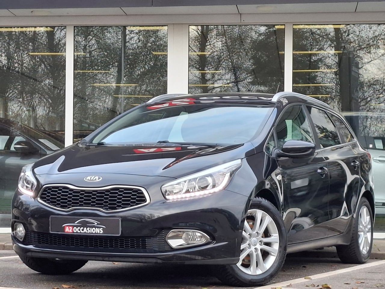 Kia Cee'd Sportswagon - 1.4 Cruise/Bluetooth/Camera/Navi/Stoelverw/PDC - AutoWereld.nl