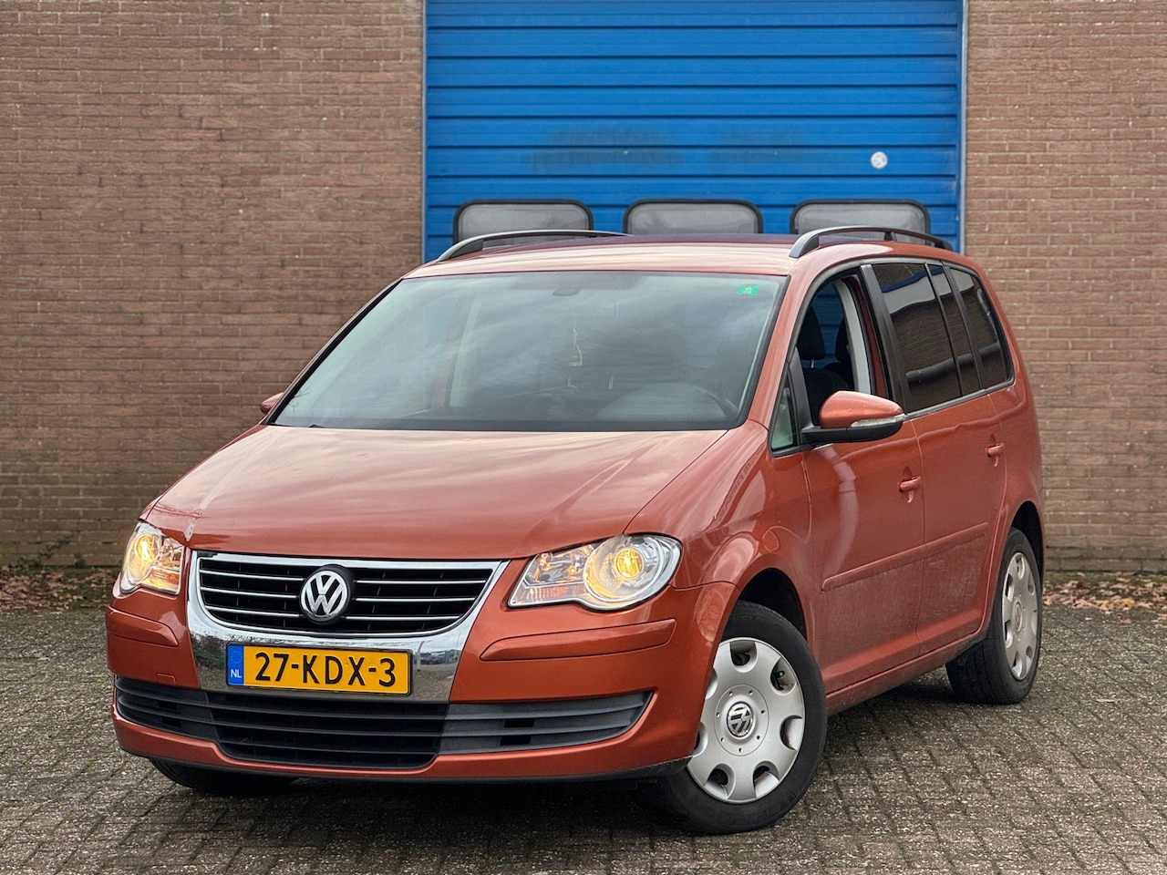 Volkswagen Touran - 1.4 TSI Comfortline 7Pers Climate Cruise Oranje - AutoWereld.nl