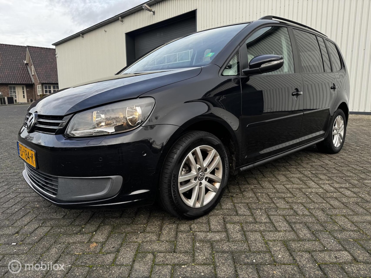 Volkswagen Touran - 1.4 TSI Highline 7p 1.4 TSI Highline 7p. - AutoWereld.nl
