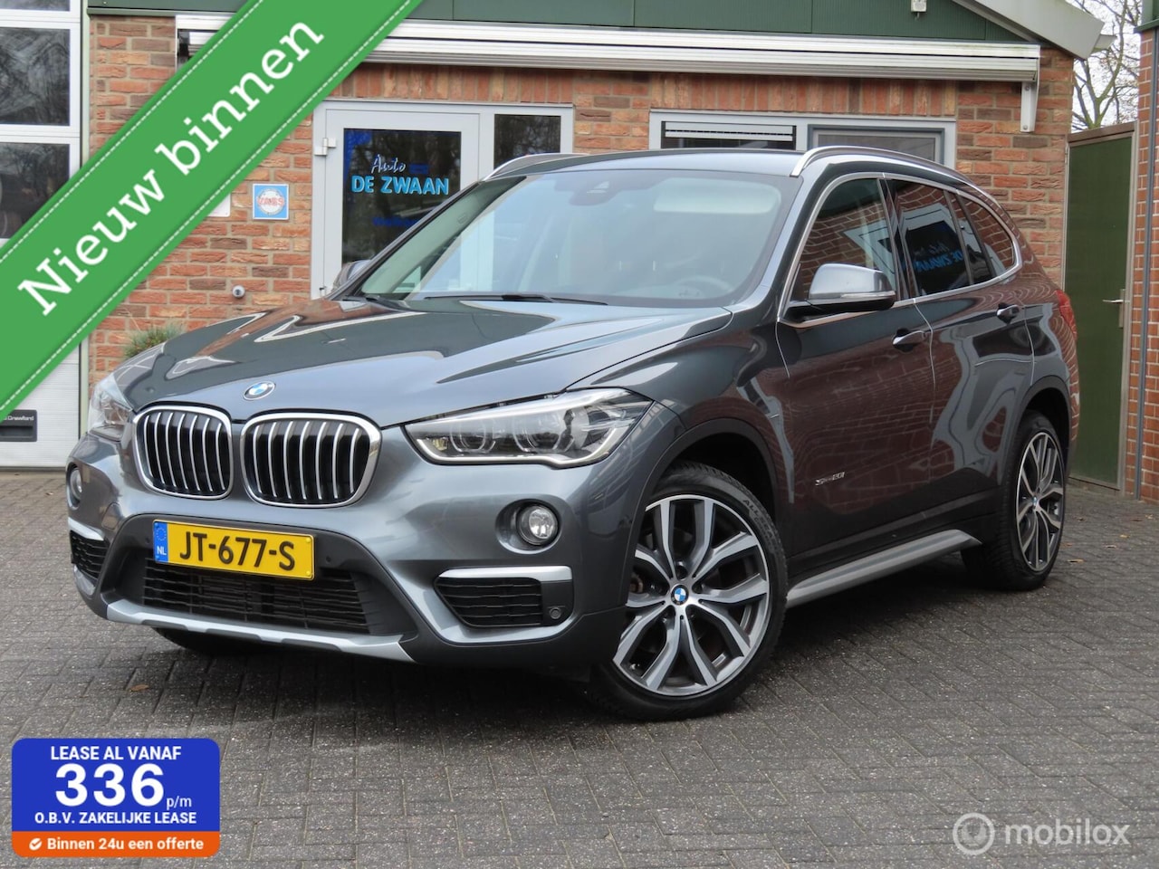 BMW X1 - sDrive20i High Executive|Sportleer|Camera|Carplay|HUD|Harman Kardon|19". - AutoWereld.nl