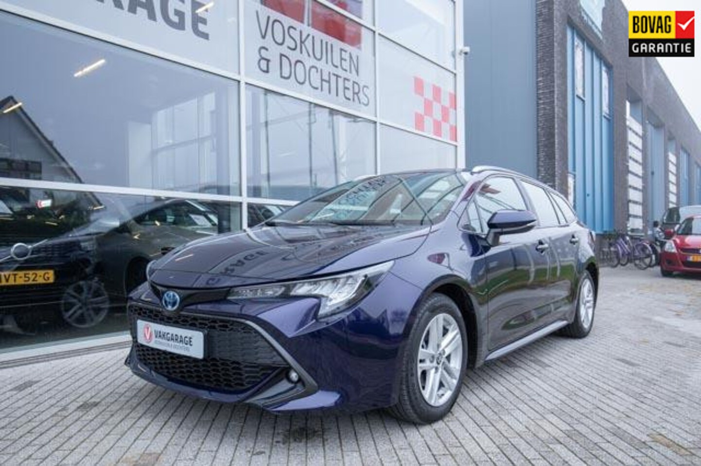 Toyota Corolla Touring Sports - 1.8 Hybrid Business | Stoelverwarming | Navigatie | Camera - AutoWereld.nl