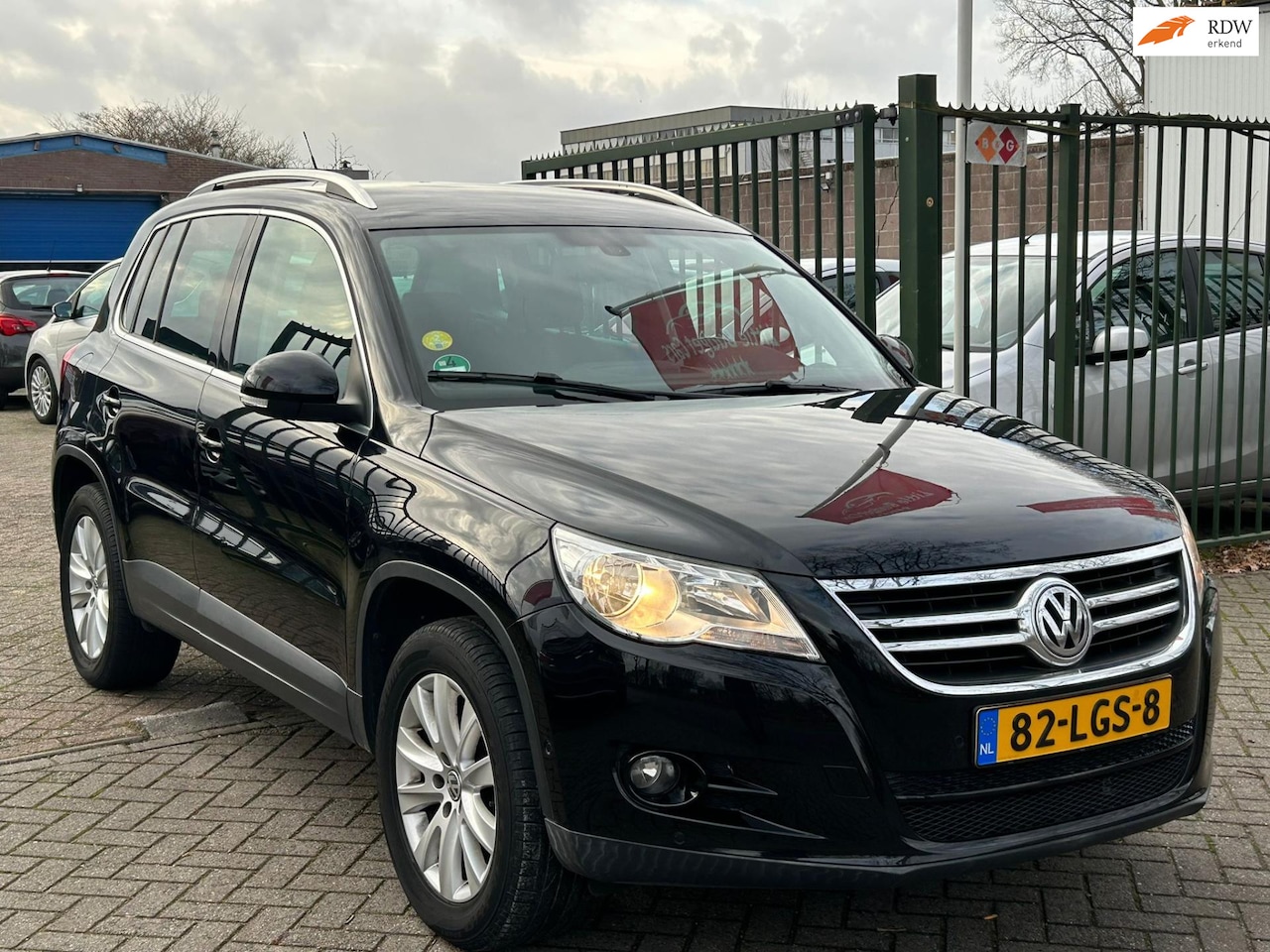 Volkswagen Tiguan - 2.0 TSI Sport&Style 4Motion Automaat achteruit camera airco cruis control parkeer sensor - AutoWereld.nl