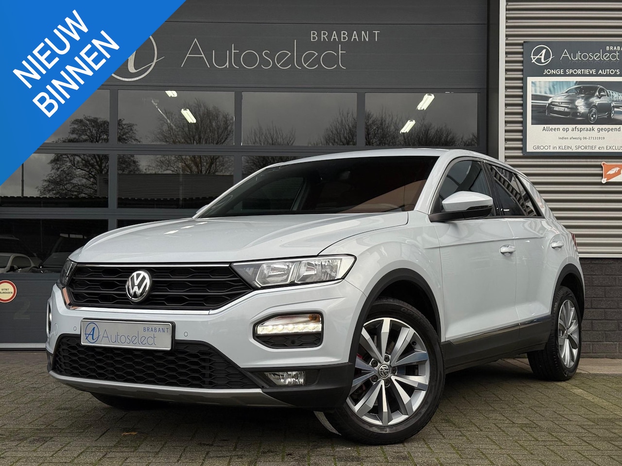 Volkswagen T-Roc - 1.5 TSI Sport DSG Navi Camera - AutoWereld.nl