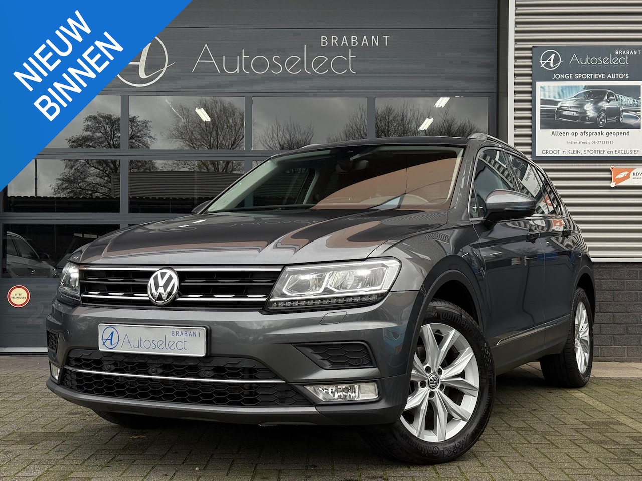 Volkswagen Tiguan - 1.4 TSI 4Motion Highline Navi Camera Trekhaak - AutoWereld.nl