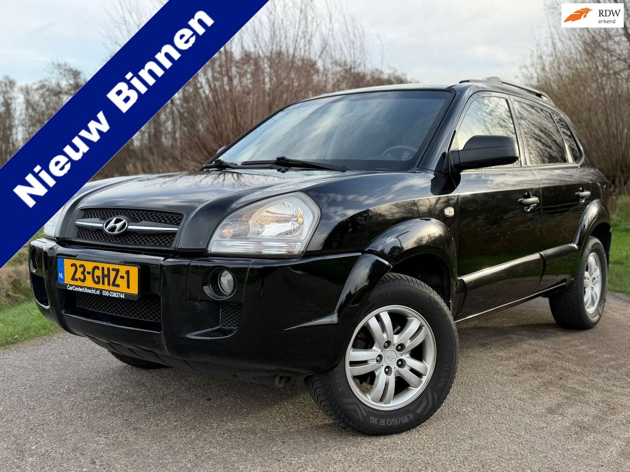 Hyundai Tucson - 2.0i Dynamic Executive / Airco / Trekhaak / 16" Velgen + 4S banden / PDC / Cruise / Nieuwe - AutoWereld.nl