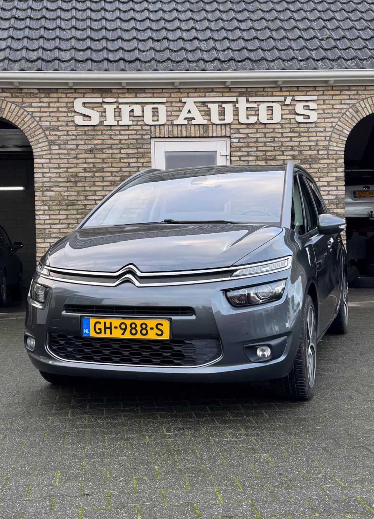 Citroën Grand C4 Picasso - 1.2 Bj 2015 7 persoons weinig kilometers - AutoWereld.nl