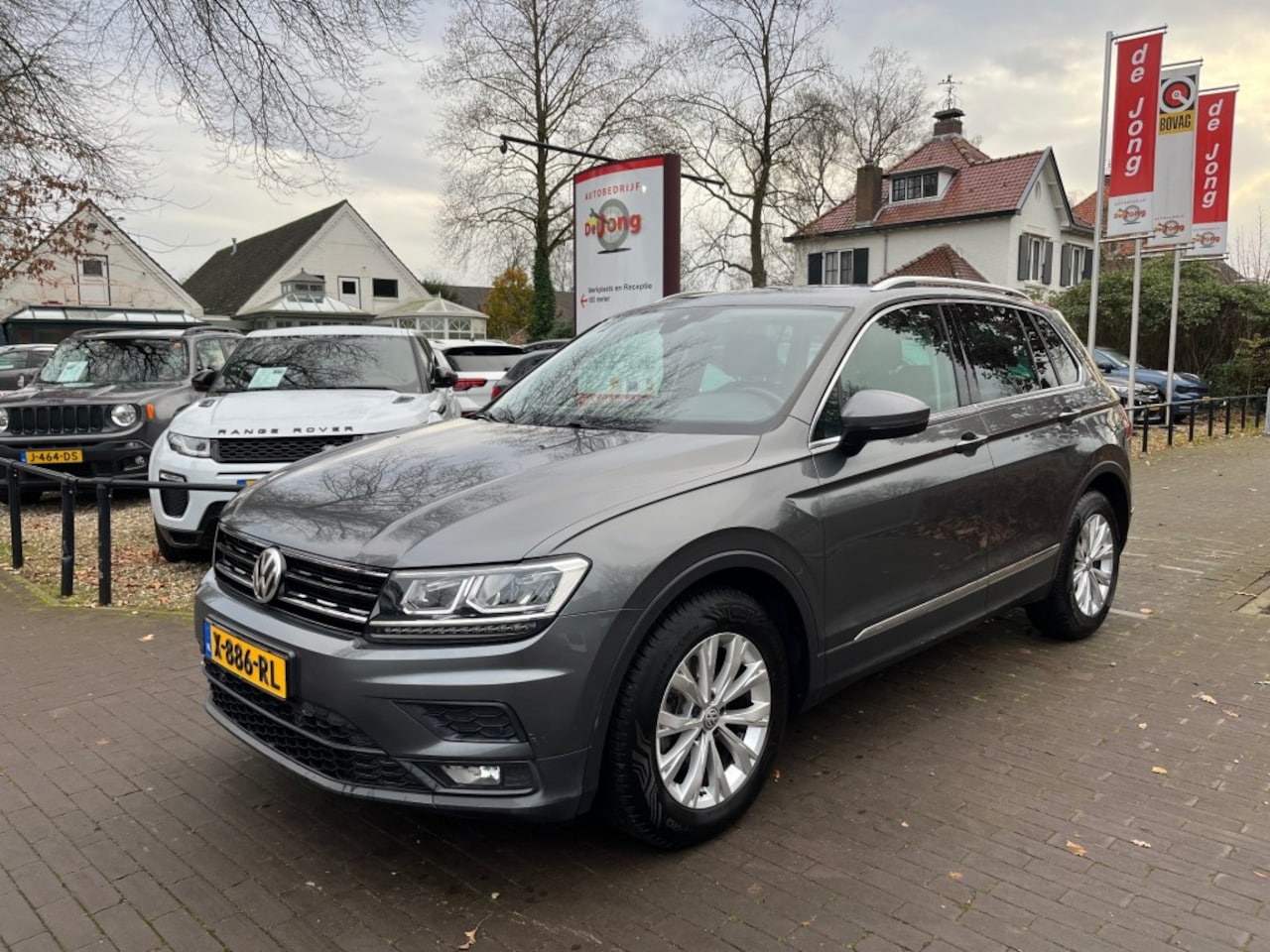 Volkswagen Tiguan - 1.4 TSI ACT 150PK AUTOMAAT / ADAP. CRUISE / TREKHAAK AFN / CARPLAY - AutoWereld.nl