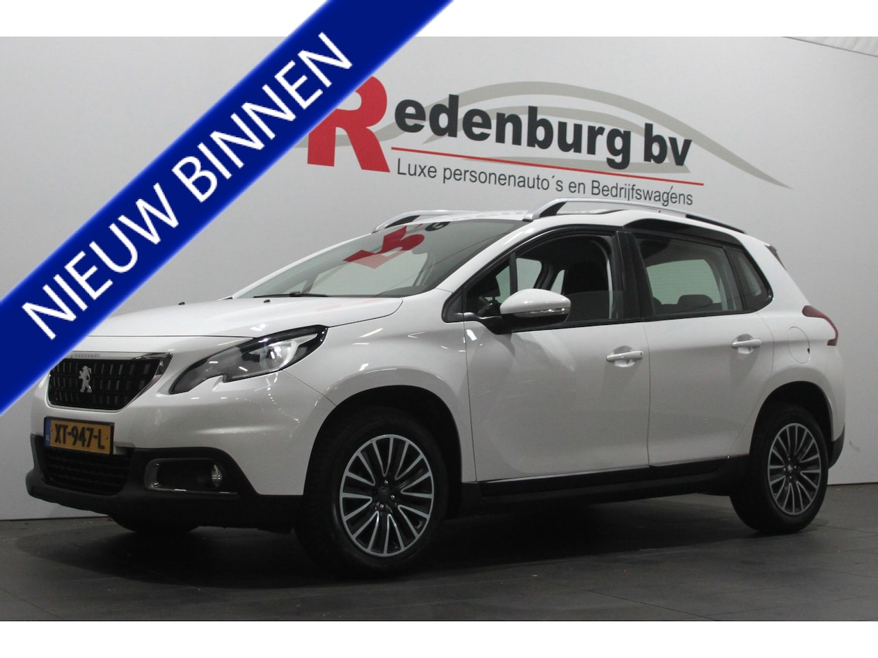 Peugeot 2008 - 1.2 PureTech Blue Lion - Automaat - Carplay / Navi / Parksens. achter - AutoWereld.nl