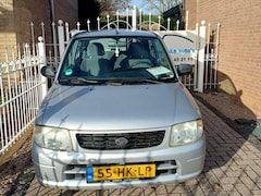 Daihatsu Cuore - 1.0-12V DVVT STi