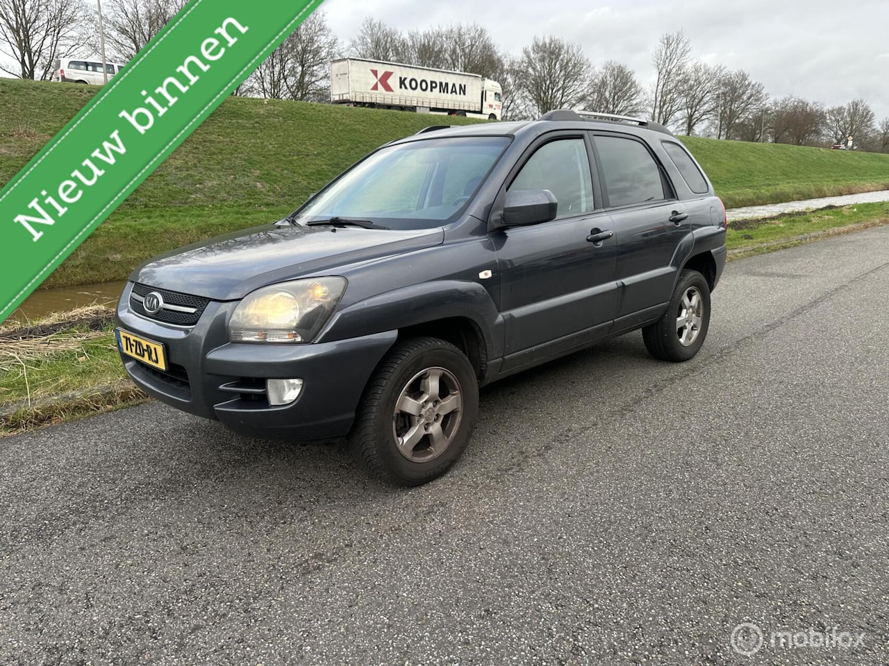 Kia Sportage - 2.0 CVVT Comfort 2.0 CVVT Comfort - AutoWereld.nl