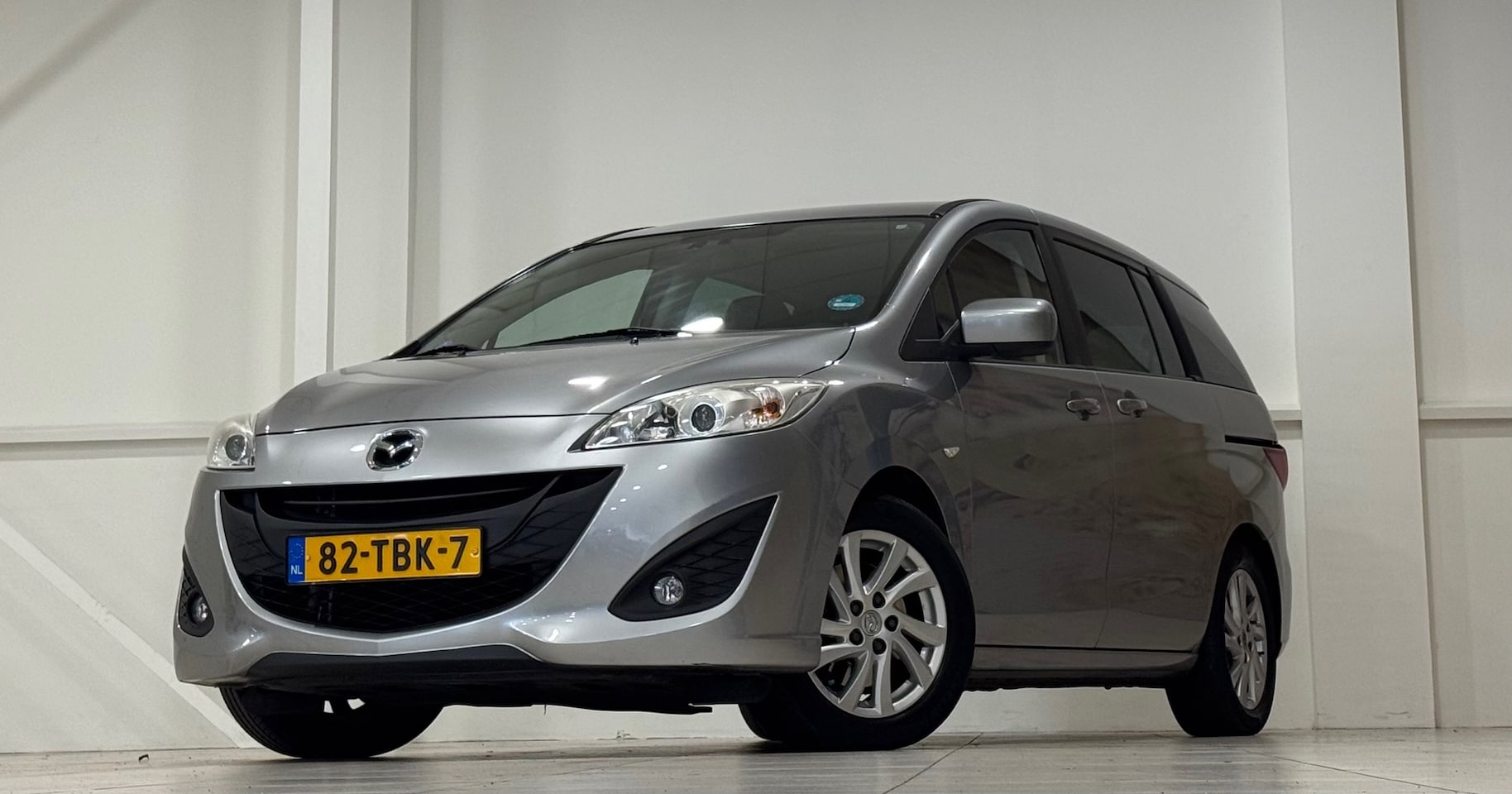 Mazda 5 - 1.8 TS+ 7p 1e Eigenaar Parkeerhulp Clima Cruise control - AutoWereld.nl