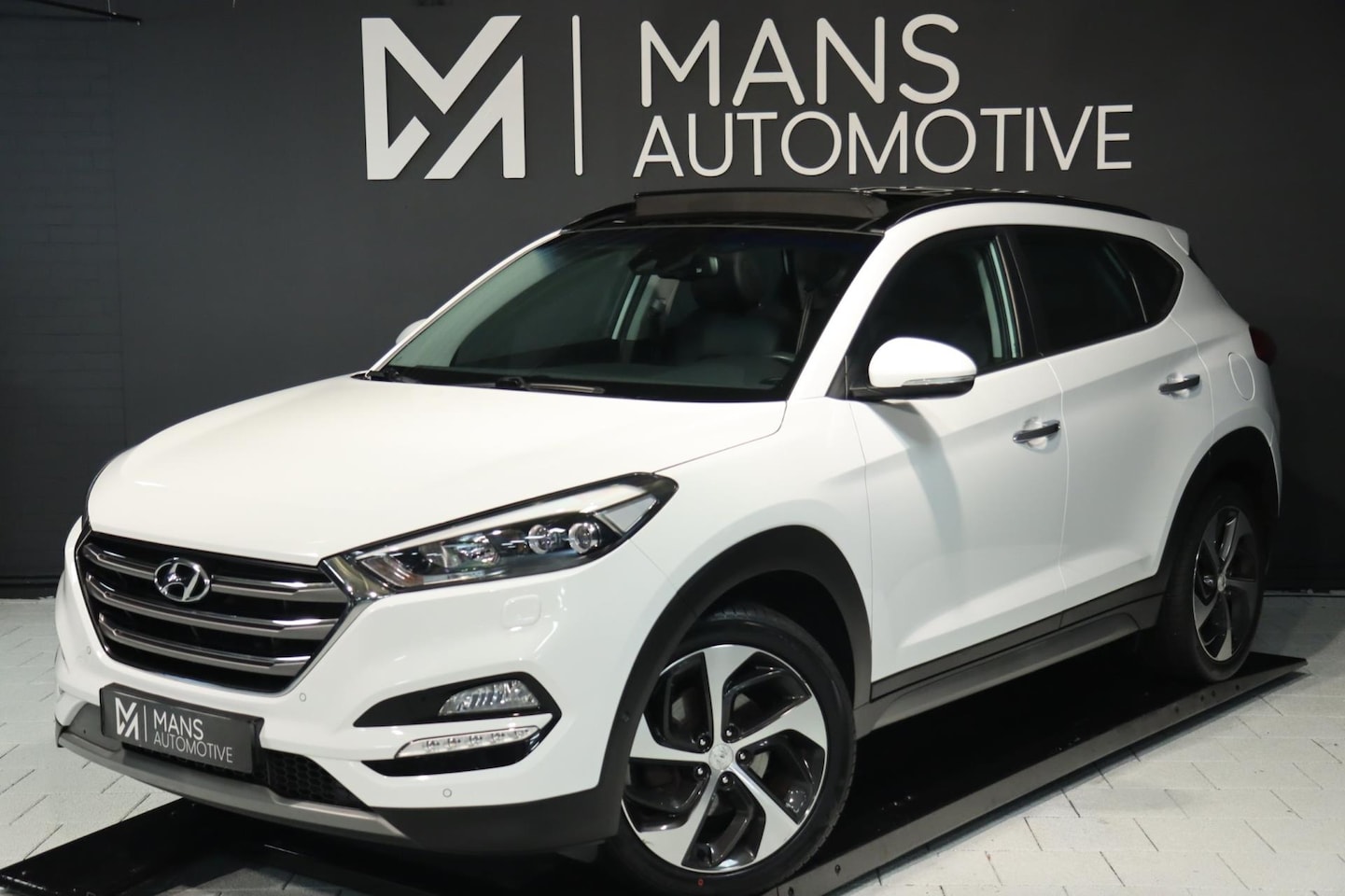 Hyundai Tucson - 1.6 T-GDi Premium 4WD / PANODAK / KEYLESS / CAMERA / DODEHOEK - AutoWereld.nl