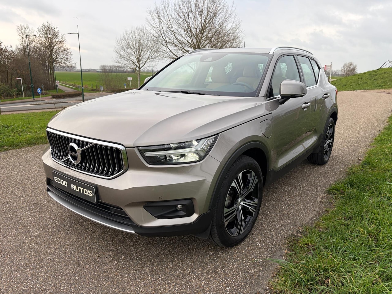 Volvo XC40 - 1.5 T4 Recharge Inscription Creme Leer - AutoWereld.nl