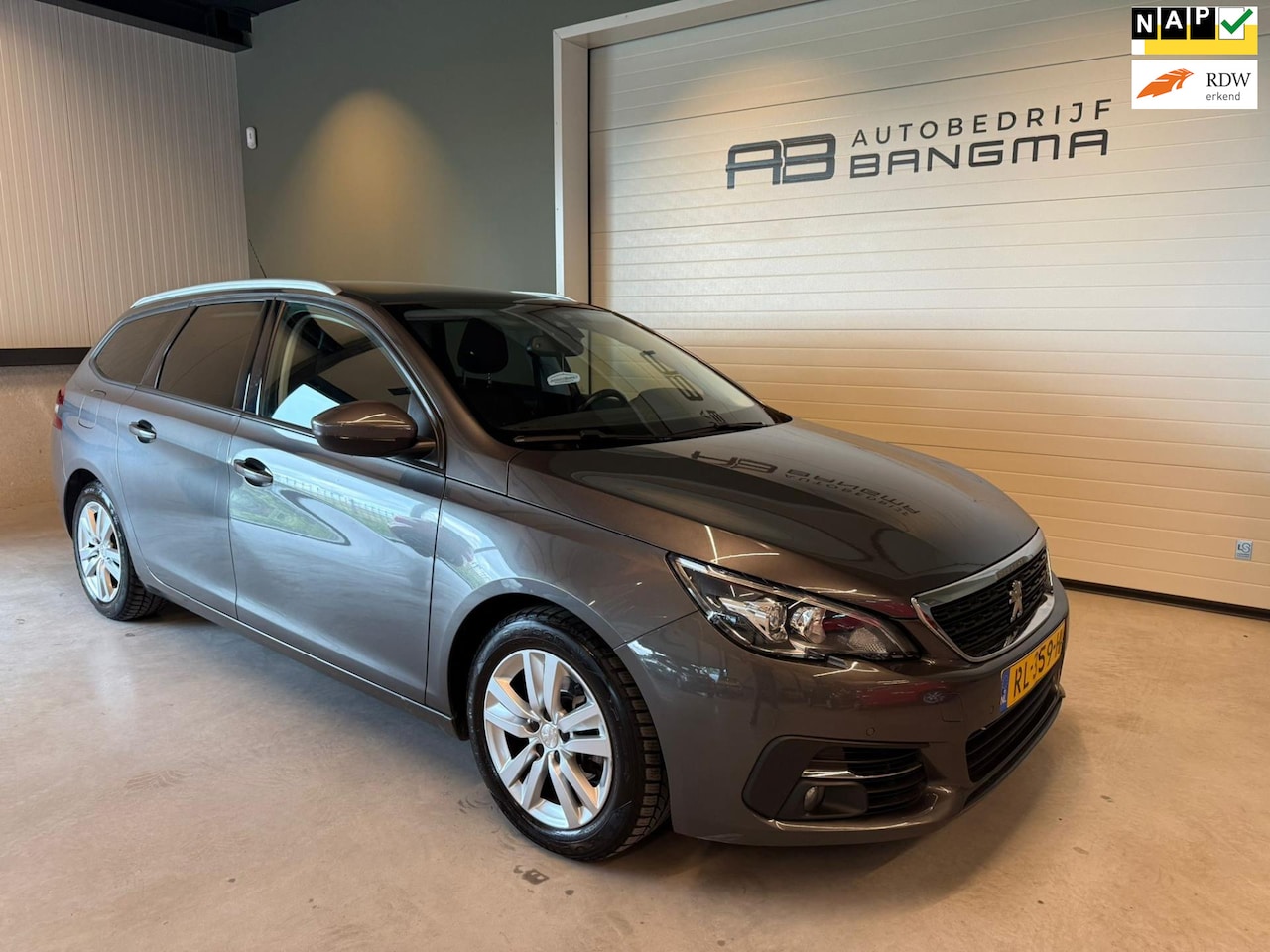 Peugeot 308 SW - 1.2 PureTech BLUE LEASE EXECUTIVE/CLIMA AIRCO/NAVIGATIE/ISOFIX/LM-VELG/PANORAMADAK/APPLE C - AutoWereld.nl