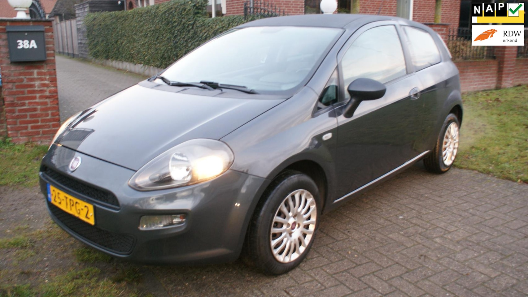 Fiat Punto Evo - 1.4 Racing half automaat - AutoWereld.nl