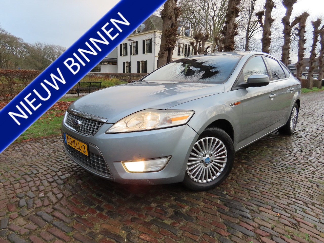 Ford Mondeo - 2.0-16V Limited Climatecontrol Cruisecontrol Navigatie Pdc Lm Velgen - AutoWereld.nl