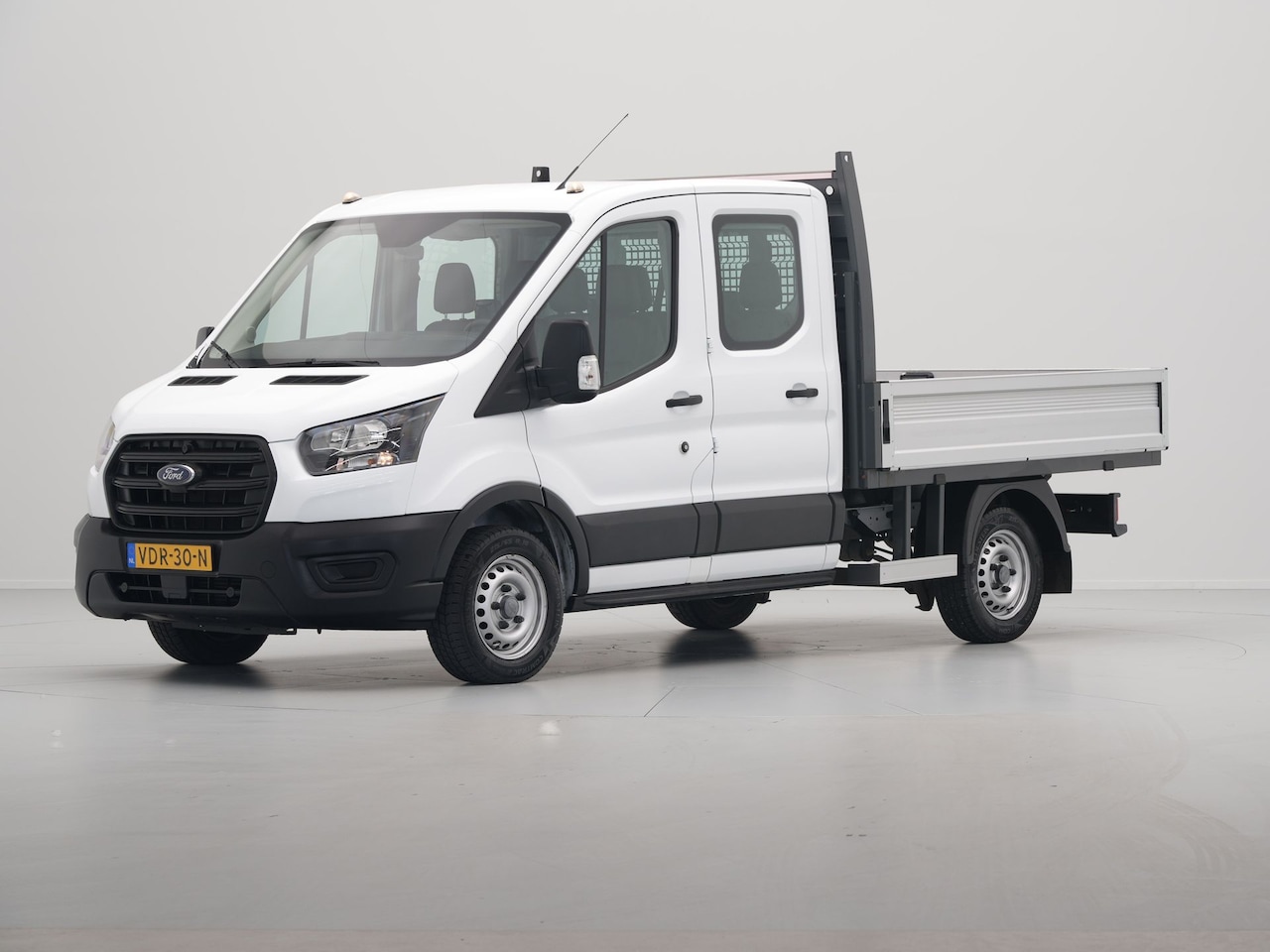 Ford Transit - Dubbele Cabine Pick-Up 310 2.0 TDCI 96kW 130PK L2H1 Ambiente Airco Bluetooth Trekhaak - AutoWereld.nl