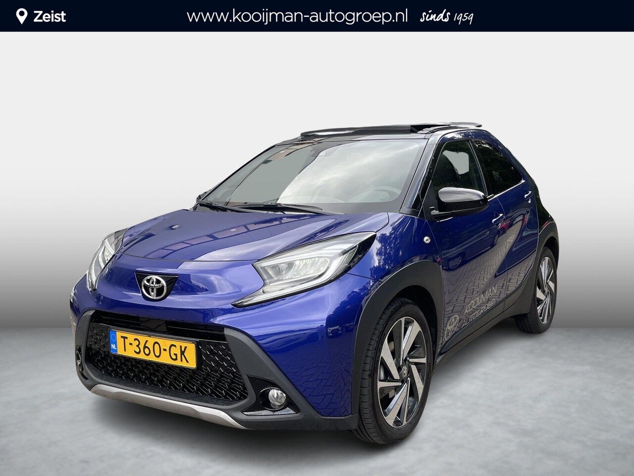 Toyota Aygo X - 1.0 VVT-i MT envy Cabrio leuke Two-Tone blauw/zwarte uitvoering | Draadloos telefoonlader - AutoWereld.nl