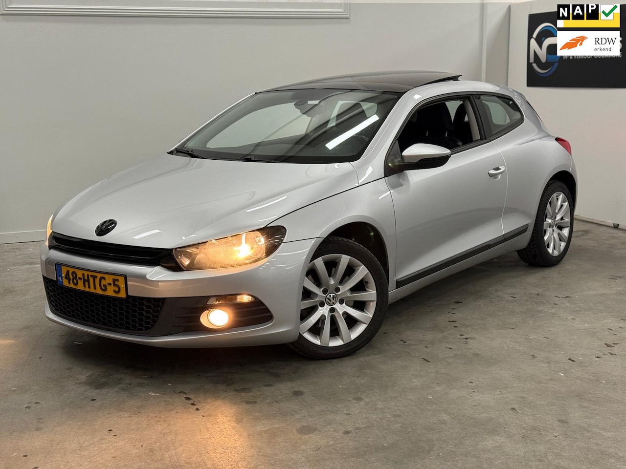 Volkswagen Scirocco - 1.4 TSI Highline Plus / PANORAMADAK / MULTIMEDIA-NAVI / NETTE AUTO - AutoWereld.nl