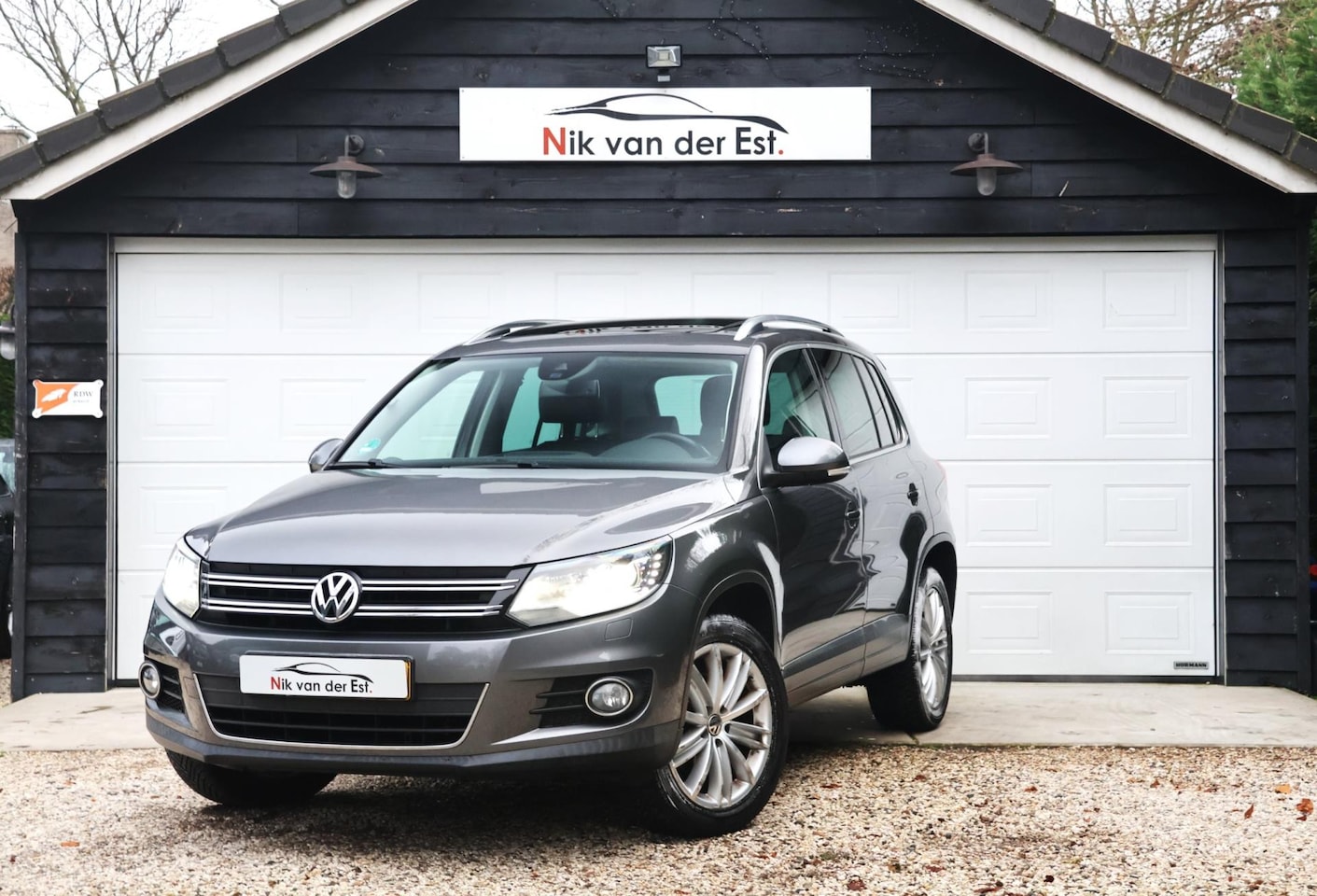 Volkswagen Tiguan - 2.0 TSI Sport&Style 4Motion-Pano-Leder-Stoelverwarming - AutoWereld.nl