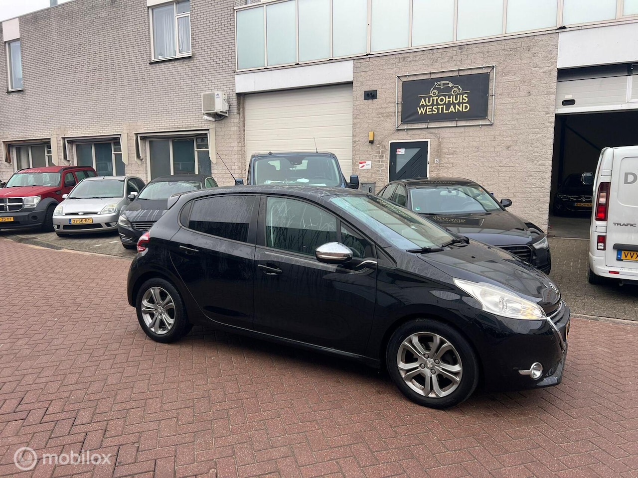Peugeot 208 - 1.2 e-VTi Envy - AutoWereld.nl