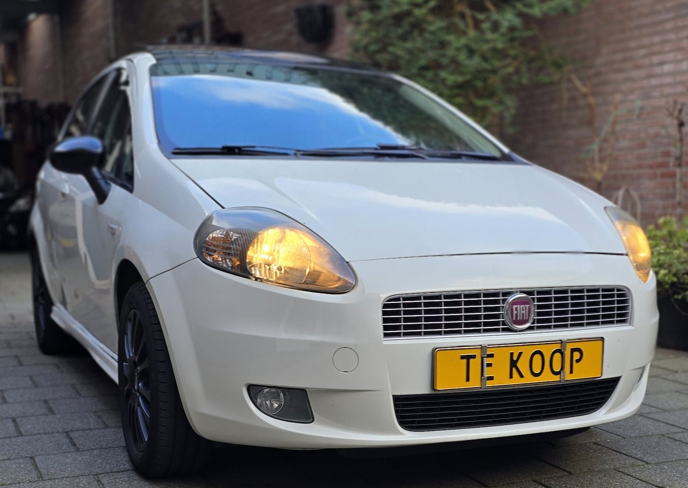 Fiat Grande Punto - 1.4 NeroBianco - AutoWereld.nl