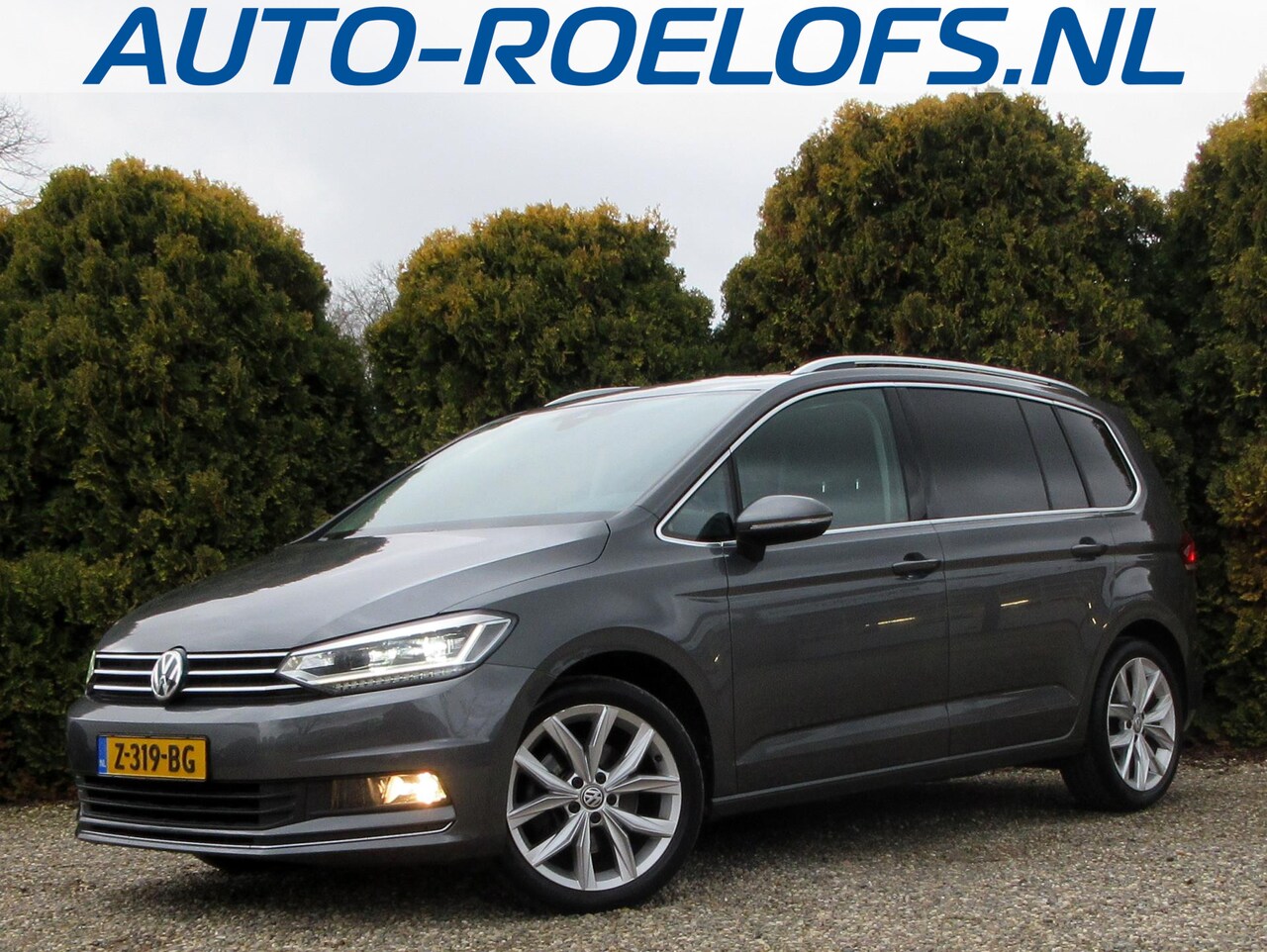 Volkswagen Touran - 1.5 TSI Highline Automaat*Navi*Pano.dak*Trekhaak* - AutoWereld.nl