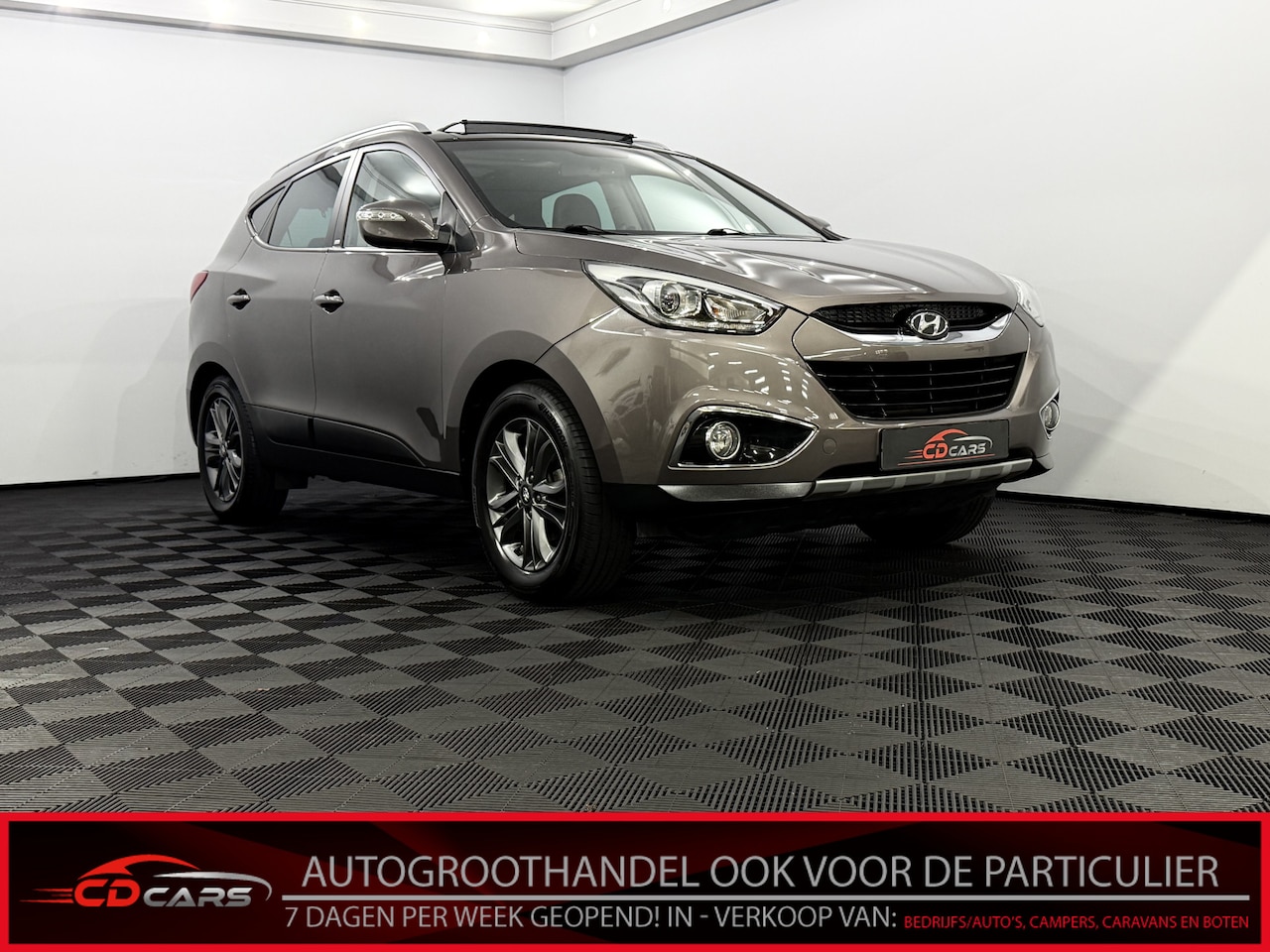 Hyundai ix35 - 1.6i GDI Go! Pano, Half leder, Camera, Navi, Cruise control, Stoelverwarming, Clima, Licht - AutoWereld.nl