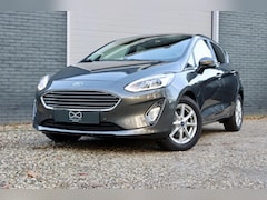 Ford Fiesta - 1.0 EcoBoost Hybrid Titanium | LED | NAVIGATIE | CARPLAY | WINTERPAKKET