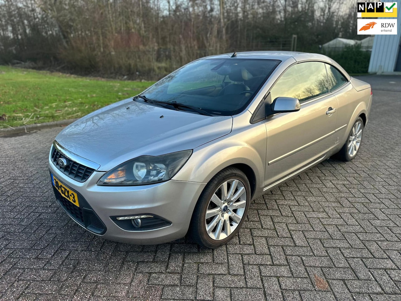 Ford Focus Coupé-Cabriolet - 2.0 Titanium/AUTOMAAT/HARDTOP/AIRCO/CRUISE/LEDER/NAVI/PARKEERSENS ACHTER/VERWARMDE VOORST/ - AutoWereld.nl