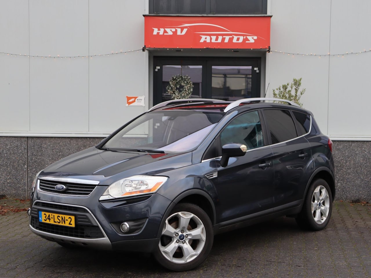 Ford Kuga - 2.0 TDCi Titanium airco LM navi - AutoWereld.nl