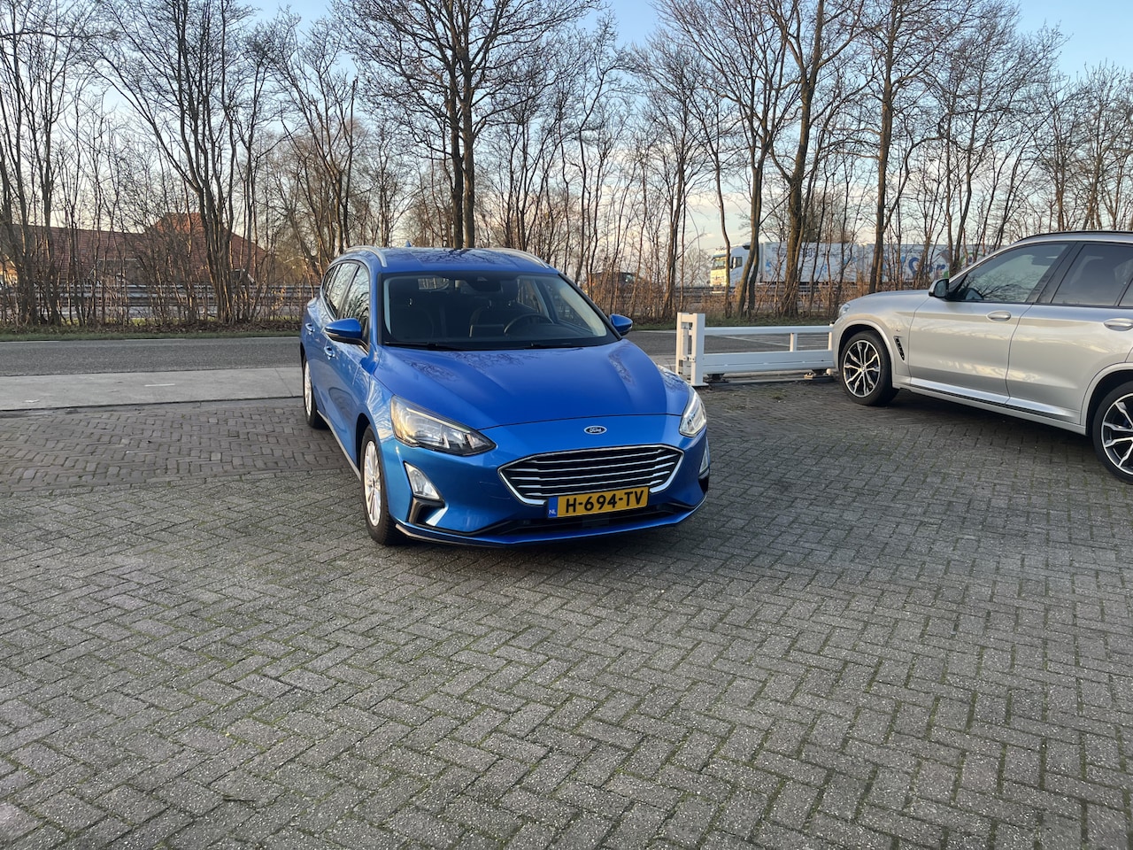 Ford Focus Wagon - 1.0 EcoBoost Titanium Business TREKHAAK CLIMA ADD CRUISE - AutoWereld.nl