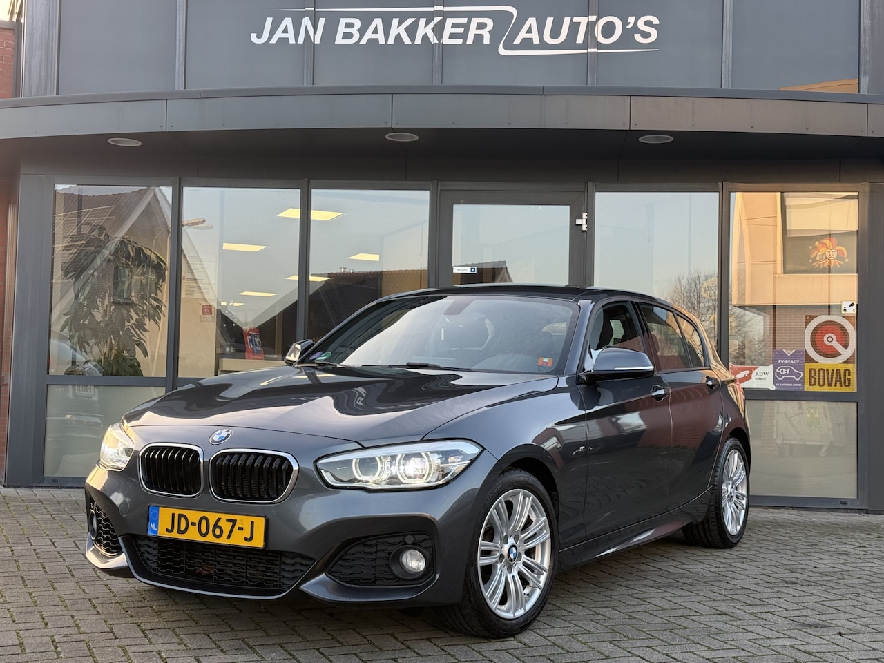 BMW 1-serie - 118i M Sport ✅ NaviPro ✅ LED ✅ Clima ✅ Afn trekhaak - AutoWereld.nl